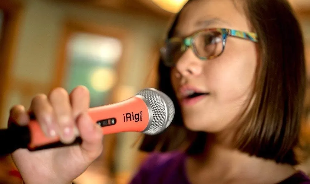 IK Multimedia iRig Voice Karaoke Microphone, Portable & Durable thermoplastic, 3.5mm Jack and on/Off Switch and Headphone Output, for iPhone, iPad, iPod Touch, Android Devices (Pink)